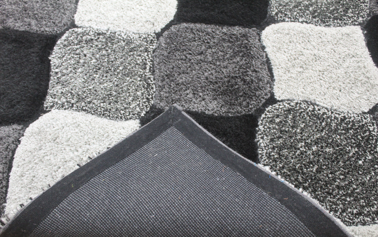 Modern Checkered Shaggy Rug – Black, Grey & White