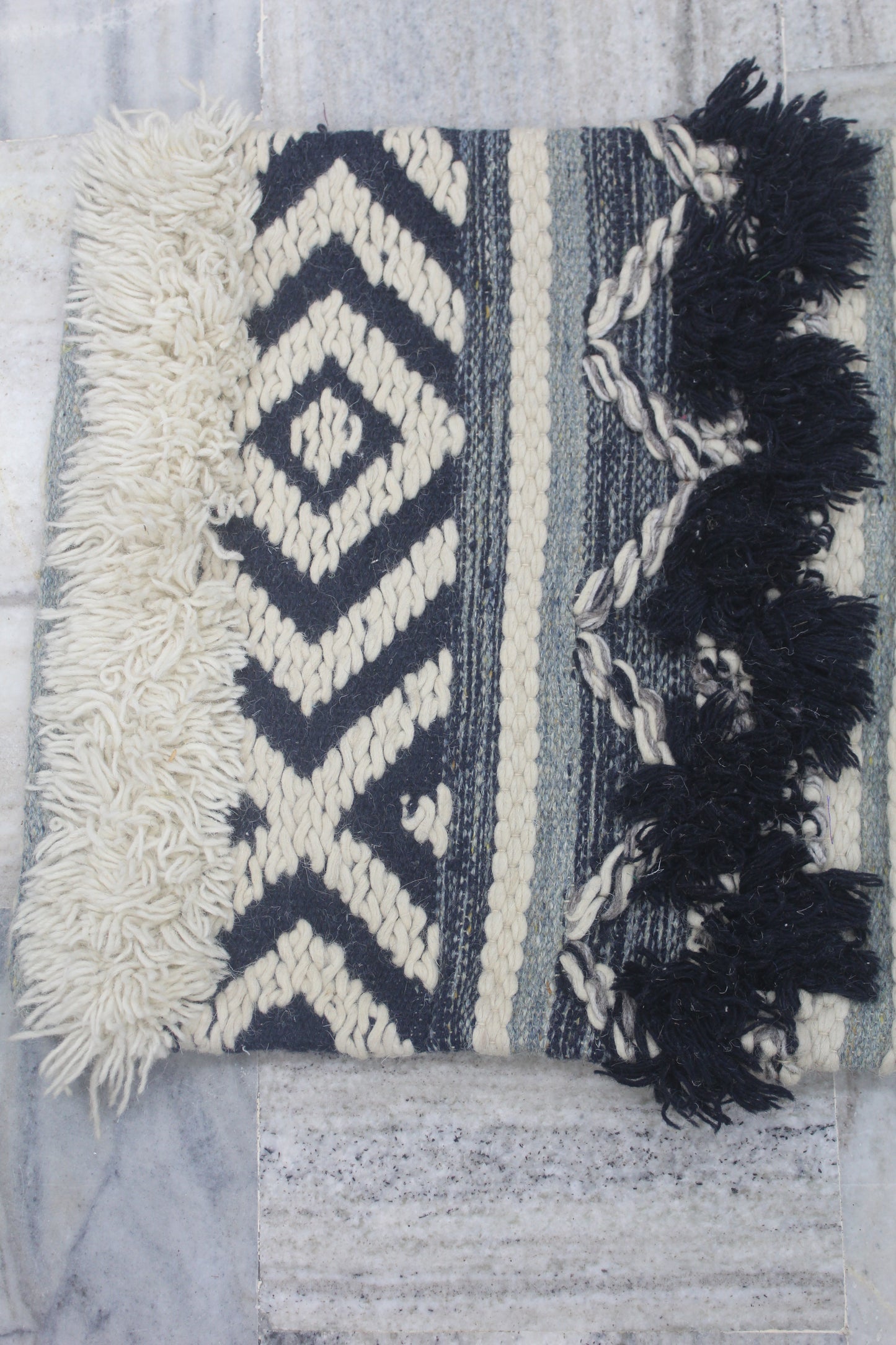 GEOMETRICAL DESIGN CUSHION COVER WITH EXTRA KNOTS AT EDGES