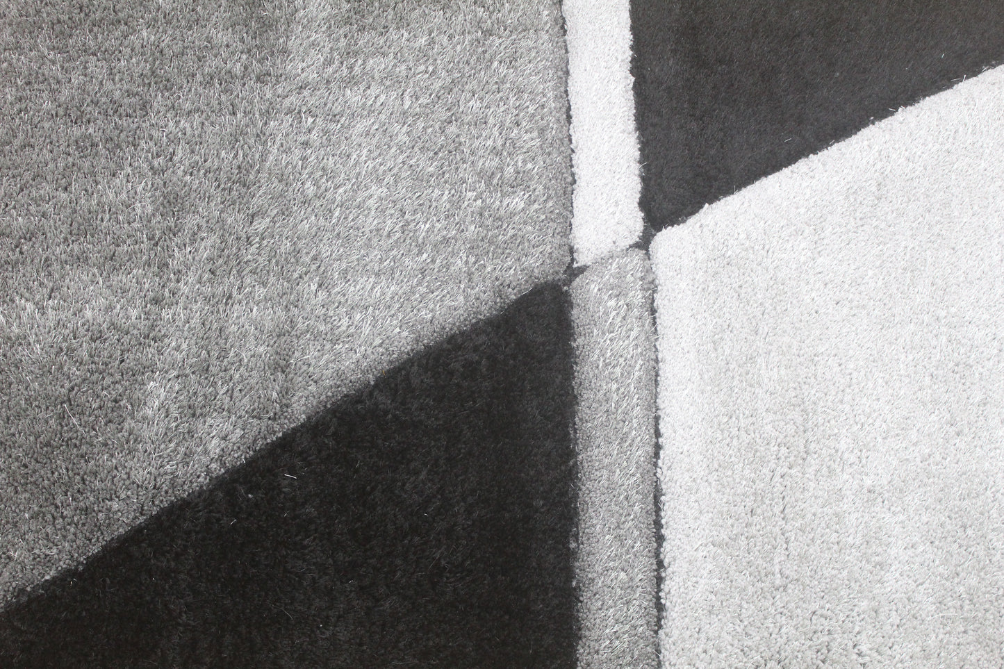 Abstract Tri-Color Shaggy Rug – Black, Grey & Silver Modern Design