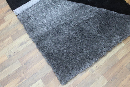 Abstract Tri-Color Shaggy Rug – Black, Grey & Silver Modern Design