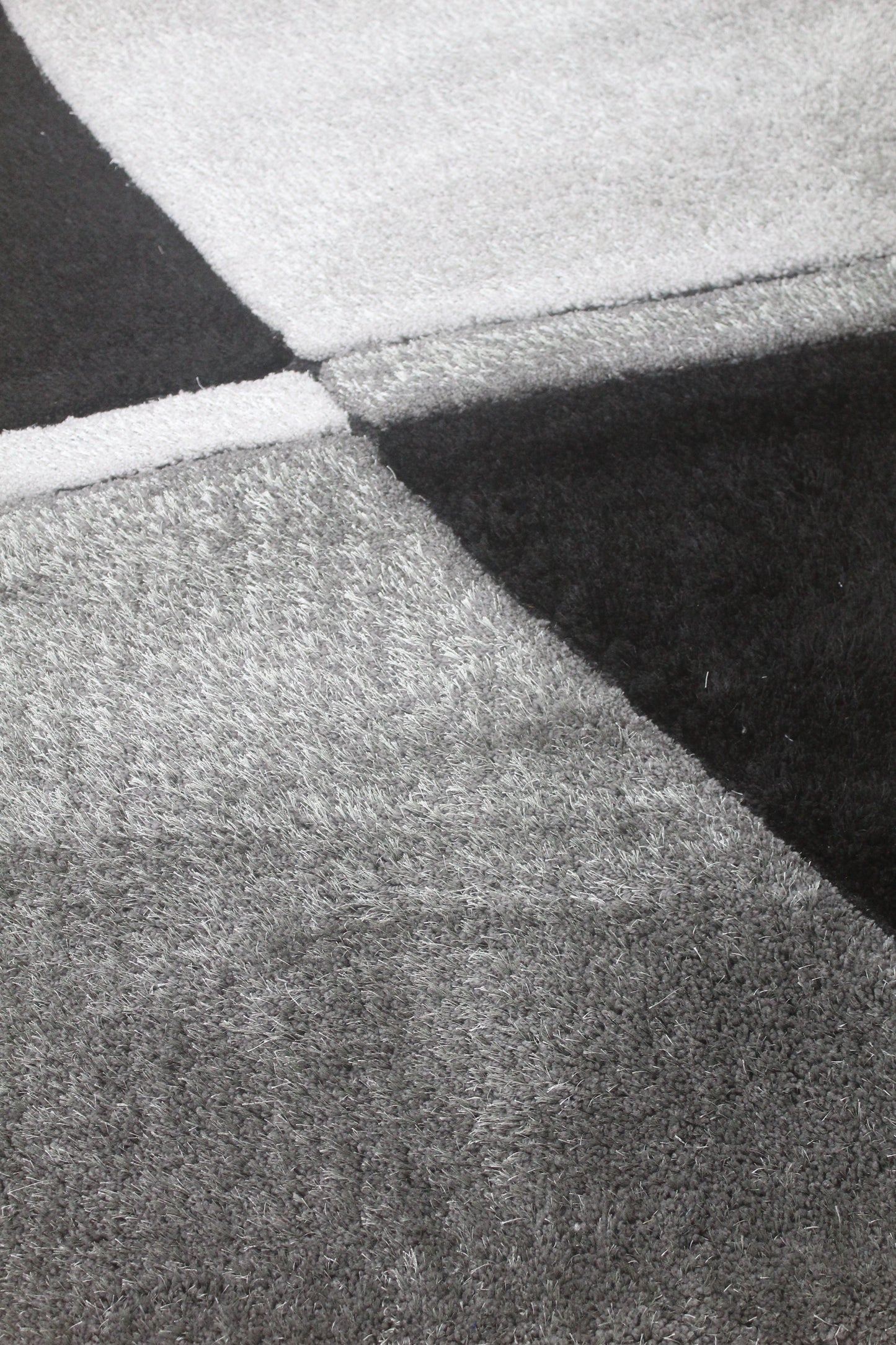 Abstract Tri-Color Shaggy Rug – Black, Grey & Silver Modern Design